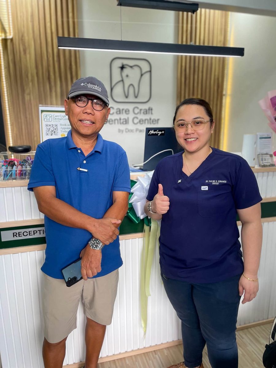 Sir Art Llupar smiling with Doc Pao at the Care Craft Dental Center reception